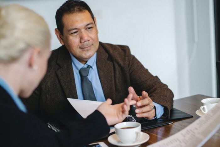 Discussing selling property portfolio